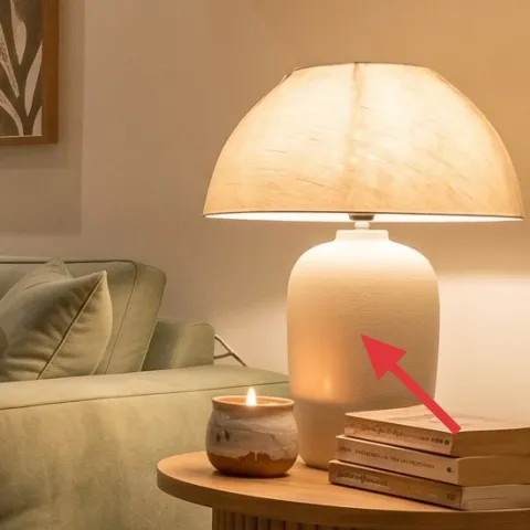 table candle in ceramic holder