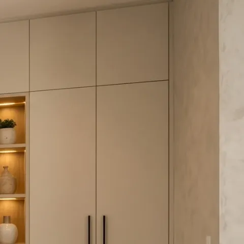 small potted plant on the right built-in shelf