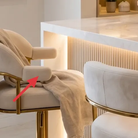 light throw blanket draped over chair arm