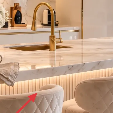folded light-colored cloth on the kitchen island