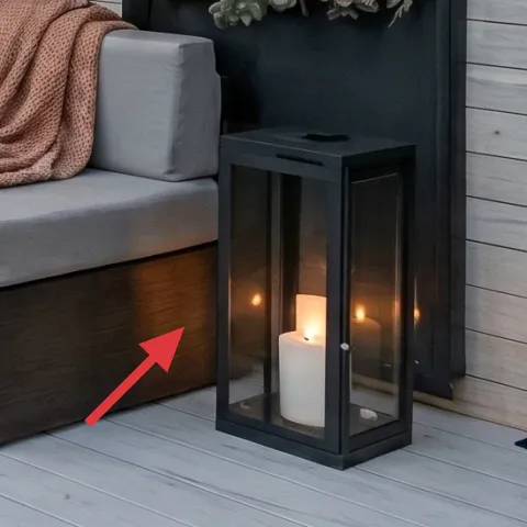 black metal lantern with candle