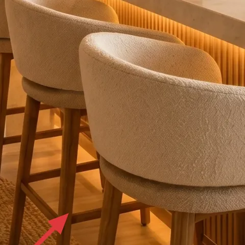 woven area rug under bar stools