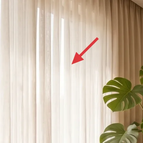 white sheer curtain panel pair