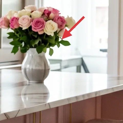 vase with pink and white roses