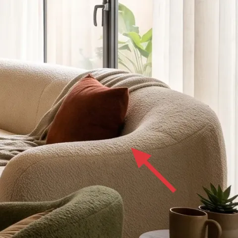 light throw blanket draped over sofa