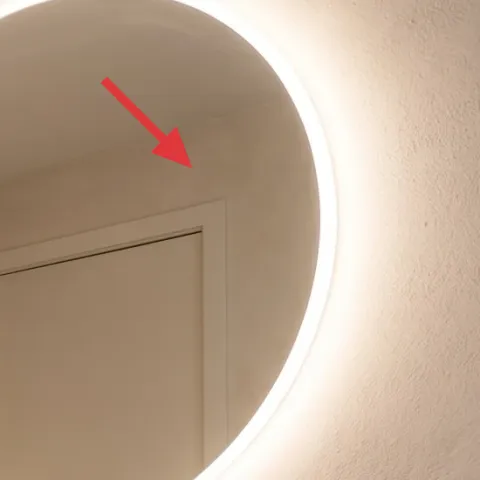 Backlit circular mirror