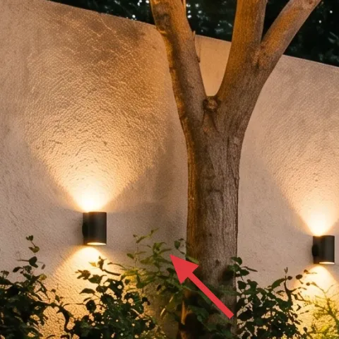 Black cylindrical wall sconces